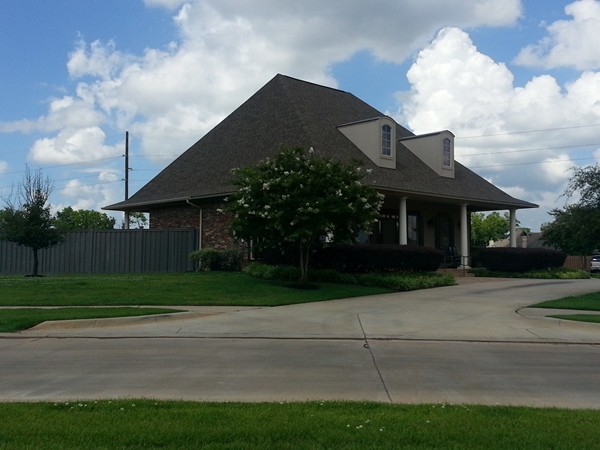 The Twelve Oaks clubhouse that features a community pool for all residents